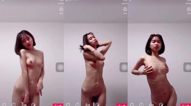 Short-haired girl takes sexy selfies