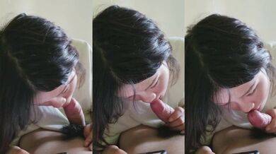 大學妹子邊玩手機邊口交