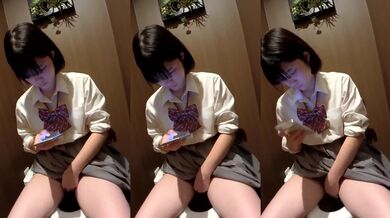 Japanese Girl Masturbating on Toilet