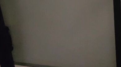 Neighbor accidentally exposes herself while closing window naked