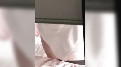 Neighbor accidentally exposes herself while closing window naked