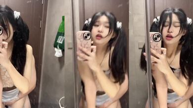 Girl with Twin Tails Takes Selfie While Boyfriend Enters Her from Behind in the Bathroom