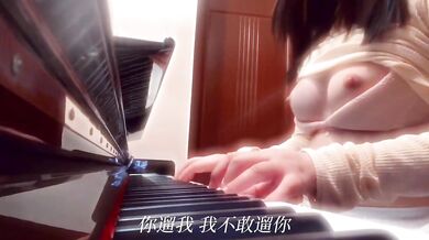 Playing Piano and Singing in a Revealing Outfit