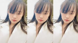 Cute Japanese girl masturbates on the street