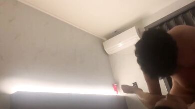 Korean couple takes selfie in hotel