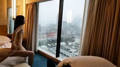 The couple had sex in a hotel room facing the beautiful view outside the window