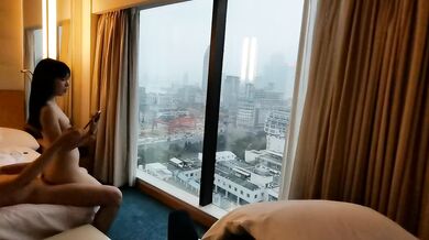 The couple had sex in a hotel room facing the beautiful view outside the window